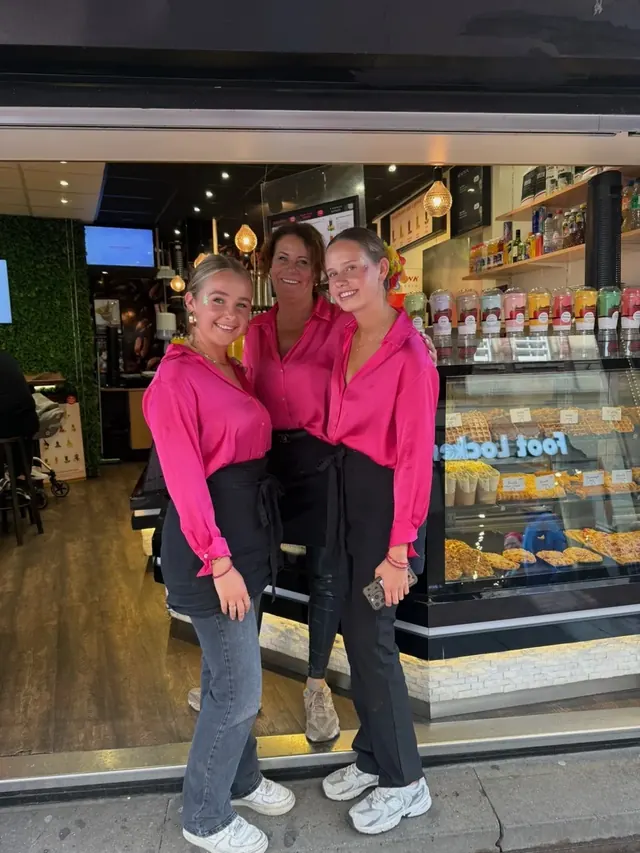 The Outmayer team in front of our Amsterdam shop, ready to welcome you